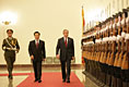 President George W. Bush and President Hu Jintao of the People's Republic of China, view Chinese troops during the welcome ceremonies for the President and Mrs. Bush at the Great Hall of People in Beijing.