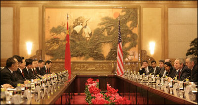 President George W. Bush and the U.S. delegation sit on the right as President Hu Jintao and his Chinese delegation sit on the opposite side during an expanded meeting Sunday, Nov. 20, 2005, at the Great Hall of the People in Beijing.