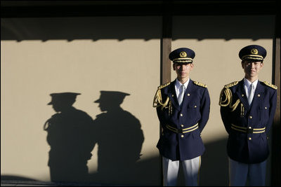 Japanese military honor guards stand at attention at the Guest House in Kyoto, Japan Wednesday, Nov. 16, 2005, where President and Mrs. Bush spent the night before attending the U.S.-Japan summit. 