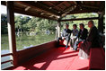 President George W. Bush, Mrs. Bush, Japan’s Prime Minister Junichiro Koizumi and the Reverend Raitei Arima, Chief Priest of the Golden Pavilion Kinkakuji Temple, pause during a cultural visit to the temple Wednesday, Nov. 16, 2005, in Kyoto.