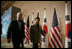 President George W. Bush and Moo Hyun Roh, President of the Republic of Korea, leave the stage at the Hotel Hyundai in Gyeongju, Korea Thursday, Nov. 17, 2005, after a joint press availability.