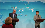 President George W. Bush and Moo Hyun Roh, President of the Republic of Korea, listen to a question from a reporter Thursday, Nov. 17, 2005, during a joint press availability at the Hotel Hyundai in Gyeongju, Korea.