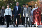 President George W. Bush and Laura Bush arrive at the Bulguksa Temple Thursday, Nov. 17, 2005, in Gyeongju, Korea with Korean President Moo Hyun Roh and his wife Yang-Sook Kwon.