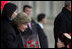 A young boy delivers a bouquet of flowers to Mrs. Bush Monday, Nov. 21, 2005, as she and President Bush joined Mongolia's President and First Lady in ceremonies in Ulaanbaatar welcoming the Bushes to Mongolia. 