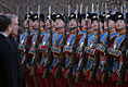 President Bush and Mongolia President Nambaryn Enkhbayar review Mongolia troops Monday, Nov. 21, 2005, as President and Mrs. Bush arrived in Ulaanbaatar on the final stop of their 7-day Asia trip. 