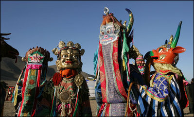 Ceremonial Mongolian characters participate in festivities in Ikh Tenger, Mongolia Monday, Nov. 21, 2005, for President and Mrs. Bush during their visit to Ulaanbaatar. 