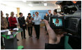 The liquid crystal display of a video camera captures Mrs. Laura Bush as she visits one of three classrooms Thursday, Nov. 17, 2005, at the Gyeongju English Village in Gyeongju, Korea.