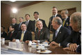 President George W. Bush and fellow APEC leaders participate in a dialogue with members of the APEC Business Advisory Council Friday, Nov. 18, 2005, prior to the opening of the 2005 APEC conference.