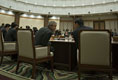 President George W. Bush shares a moment with Thailand Prime Minister Thaksin Chinnawat during the APEC retreat Saturday, Nov. 19, 2005, at the Nurimaru APEC House in Busan.