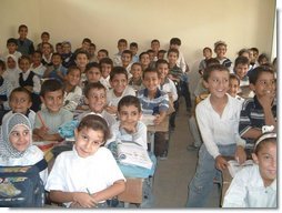 Iraqi boys and girls are excited to learn in their first year of school without Saddam.