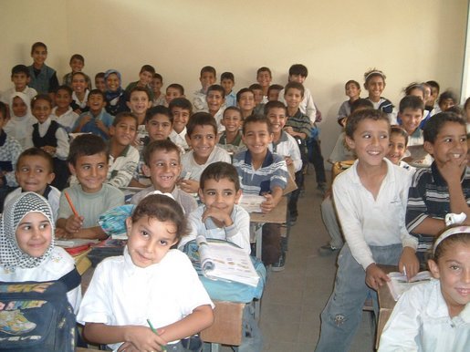 Iraqi boys and girls are excited to learn in their first year of school without Saddam.