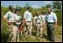 President George W. Bush talks with AmeriCorps volunteers at Rookery Bay National Estuarine Research Reserve in Naples, Fla., Friday, April 22, 2004. 