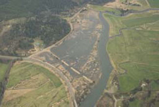 At the Nestucca Bay National Wildlife Refuge in Oregon, the FWS worked with multiple federal, state, tribal, and local agencies, as well as with conservation groups and a private foundation, to remove dikes and thereby restore 82 acres of estuarine wetlands benefiting migratory birds, salmon, and other species. (FWS)