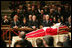 Pictured from left, President George W. Bush, Laura Bush, former President George H. W. Bush, former President Bill Clinton, Secretary of State Condoleezza Rice and White House Chief of Staff Andy Card pay their respects to Pope John Paul II as he lies in state in St. Peter's Basilica at the Vatican Wednesday, April 6, 2005.