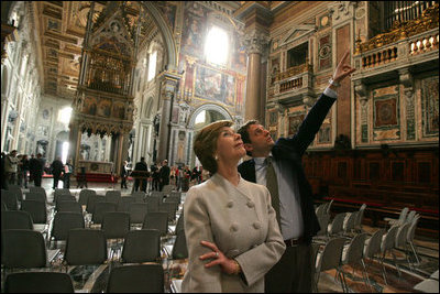 First lady Laura Bush is given a tour of St. John at the Lateran Church in Rome by art historian Dr. Stefano Aluffi-Pentini Thursday, April 7, 2005. The President and Mrs. Bush are in Italy for the scheduled Friday funeral of Pope John Paul II.