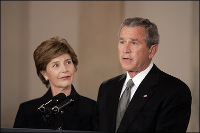 President George W. Bush gives remarks on the death of Pope John Paul II with First Lady Mrs. Laura Bush at the White House on Saturday April 2, 2005.