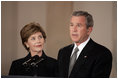 President George W. Bush gives remarks on the death of Pope John Paul II with First Lady Mrs. Laura Bush at the White House on Saturday April 2, 2005.