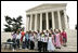 Laura Bush and Secretary of Interior Gale Norton joins Guilford Elementary School students in taking the Junior Ranger pledge from National Park Service Director Fran Mainella during an event at the Thomas Jefferson Memorial in Washington, D.C., April 21, 2005.