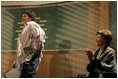 Laura Bush listens as students read aloud in class during a Helping America's Youth event at Chipman Middle School in Alameda, Calif., April 28, 2005.