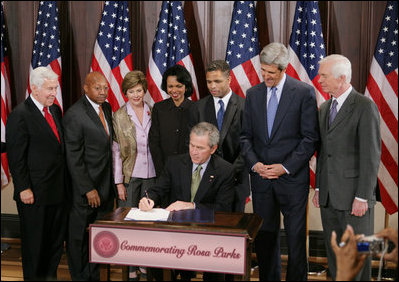 President George W. Bush is seen Thursday, Dec. 1. 2005 in the Eisenhower Executuive Office Building in Washington, as he signs H.R. 4145, to Direct the Joint Committee on the Library to Obtain a Statue of Rosa Parks, which will be placed in the US Capitol's National Statuary Hall. The President is joined by, from left to right, U.S. Sen. Richard G. Lugar, R-Ind., U.S. Secretary of Housing and Urban Development Alphonso Jackson, Mrs. Laura Bush, U.S. Secretary of State Condoleezza Rice, U.S. Rep. Jesse Jackson Jr., D-Ill., U.S. Sen. John Kerry, D-Mass., and U.S. Sen. Thad Cochran, R-Miss.