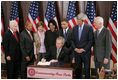 President George W. Bush is seen Thursday, Dec. 1. 2005 in the Eisenhower Executuive Office Building in Washington, as he signs H.R. 4145, to Direct the Joint Committee on the Library to Obtain a Statue of Rosa Parks, which will be placed in the US Capitol's National Statuary Hall. The President is joined by, from left to right, U.S. Sen. Richard G. Lugar, R-Ind., U.S. Secretary of Housing and Urban Development Alphonso Jackson, Mrs. Laura Bush, U.S. Secretary of State Condoleezza Rice, U.S. Rep. Jesse Jackson Jr., D-Ill., U.S. Sen. John Kerry, D-Mass., and U.S. Sen. Thad Cochran, R-Miss.