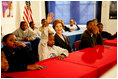 Laura Bush listens as boys participating in the Passport to Manhood program share ideas about respect and love during a visit to the Germantown Boys and Girls Club Tuesday, Feb. 3, 2005 in Philadelphia. Passport to Manhood promotes and teaches responsibility through a series of male club members ages 11-14.