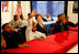 Laura Bush listens as boys participating in the Passport to Manhood program share ideas about respect and love during a visit to the Germantown Boys and Girls Club Tuesday, Feb. 3, 2005 in Philadelphia. Passport to Manhood promotes and teaches responsibility through a series of male club members ages 11-14.