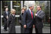 President George W. Bush, Laura Bush, German Chancellor Gerhard Schroeder, right, and Mrs. Schroeder-Koepf, left, visit before touring the Gutenberg Museum in Mainz, Germany, Feb. 23, 2005.