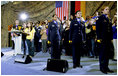 Students of General H. H. Arnold High School lead Mrs. Bush and the audience in the Pledge of Allegiance prior to her remarks Tuesday, Feb. 22, 2005, in Wiesbaden, Germany.