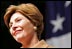 Laura Bush delivers remarks to U.S. soldiers and spouses during a visit to Ramstein Air Base Tuesday, Feb. 22, 2005 in Ramstein, Germany. Mrs. Bush thanked U.S. servicemen and women and the families that support them for their bravery and sacrifice.