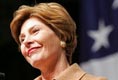 Laura Bush delivers remarks to U.S. soldiers and spouses during a visit to Ramstein Air Base Tuesday, Feb. 22, 2005 in Ramstein, Germany. Mrs. Bush thanked U.S. servicemen and women and the families that support them for their bravery and sacrifice.