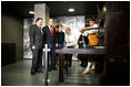 President George W. Bush, Laura Bush, German Chancellor Gerhard Schroeder, and Mrs. Schroeder-Koepf view the Gutenberg Press during a tour of the Gutenberg Museum in Mainz, Germany, Wednesday, Feb. 23, 2005.