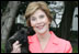 Laura Bush holds Miss Beazley shortly after the arrival of the 10-week-old Scottish terrier to the White House Thursday, Jan. 6, 2005. White House photo by Susan Sterner.