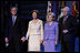 President George W. Bush stands with Laura Bush, Lynne Cheney and Vice President Dick Cheney during the pre-inaugural event "Saluting Those Who Serve" at the MCI Center in Washington, D.C., Tuesday Jan. 18, 2005.