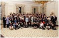 President George W. Bush, Laura Bush, former President George H. W. Bush, and former First Lady Barbara Bush pose for a portrait with members of their extended family in the East Room of the White House, Wednesday, Jan. 19, 2005.