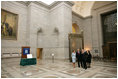 President George W. Bush and Laura Bush tour of the National Archives in Washington, D.C., with National Archivist John Carlin, second on right, and Senior Curator Stacy Bredhoff, right, Wednesday, Jan. 19, 2005. During their tour, President Bush and Mrs. Bush viewed the U.S. Constitution, the Bill of Rights, George Washington's first inaugural address, and the Declaration of Independence.