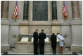 President George W. Bush and Laura Bush view the U.S. Constitution with National Archivist John Carlin, second on left, and Senior Curator Stacy Bredhoff, second on right, while touring the National Archives in Washington, D.C., Wednesday, Jan. 19, 2005. The Bushes also looked at the Declaration of Independence, George Washington's handwritten inaugural address, George Washington and President George H. W. Bush's inaugural Bible, and the Bill of Rights.