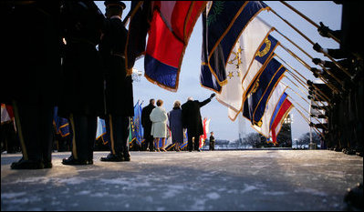 Marking the beginning of the concert, President George W. Bush, Laura Bush, Vice President Dick Cheney and Lynne Cheney greet the audience attending 'A Celebration of Freedom' on the Ellipse in Washington, D.C., Wednesday, Jan. 19, 2005. The event featured American icons including astronaut Neil Armstrong, Opera singer Andrea Bocelli, pianist Van Cliburn, singer Patti LaBelle, actress Angie Harmon, actor Gary Sinise, astronaut Buzz Aldrin, and NASCAR driver Dale Earnhardt, Jr.