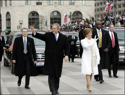 President George W. Bush and Laura Bush lead the Inaugural Parade down Pennsylvania Avenue en route the White House, Thursday, Jan. 20, 2005. Marking the beginning of his second term, President Bush took the oath of office during a ceremony at the U.S. Capitol.