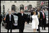 President George W. Bush and Laura Bush lead the Inaugural Parade down Pennsylvania Avenue en route the White House, Thursday, Jan. 20, 2005. Marking the beginning of his second term, President Bush took the oath of office during a ceremony at the U.S. Capitol.