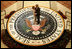 President George W. Bush and Laura Bush dance on the Presidential Seal at the Commander-in-Chief Inaugural Ball at the National Building Museum in Washington, D.C., Thursday, Jan. 20, 2005.