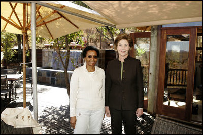 Laura Bush meets with Mrs. Zanele Mbeki, wife of South African President Thabo Mbeki Monday, July 11, 2005, at the Etali Lodge in the Madikwe Game Reserve in South Africa.