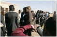 First Lady Laura Bush poses for pictures upon her departure Monday, July 11, 2005 at Gaborone International Airport in Gaborone, Botswana.