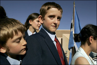 Schoolboys await the departure Monday, July 11, 2005 of Laura Bush from Gaborone International Airport in Gaborone, Botswana.