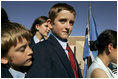 Schoolboys await the departure Monday, July 11, 2005 of Laura Bush from Gaborone International Airport in Gaborone, Botswana.