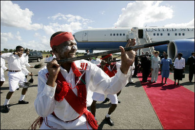 Laura Bush participates in an arrival ceremony at Dar es Salaam International Airport in Dar es Salaam, Tanzania, Wednesday, July 13, 2005.