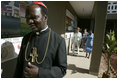 Led by Polycarp Cardinal Pengo, Laura Bush tours PASADA with Madame Anna Mkapa in Dar es Salaam, Tanzania, Wednesday, July 13, 2005. "For 13 years, the people of PASADA have provided services to men, women and children, whether they are infected with HIV or not. PASADA provides health education in communities, teaching teens and adults about the risks of HIV transmission," said Mrs. Bush in her remarks.