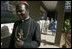 Led by Polycarp Cardinal Pengo, Laura Bush tours PASADA with Madame Anna Mkapa in Dar es Salaam, Tanzania, Wednesday, July 13, 2005. "For 13 years, the people of PASADA have provided services to men, women and children, whether they are infected with HIV or not. PASADA provides health education in communities, teaching teens and adults about the risks of HIV transmission," said Mrs. Bush in her remarks.