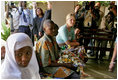 Jenna Bush listens to children with HIV/AIDS at PASADA in Dar es Salaam, Tanzania, Wednesday, July 13, 2005. "PASADA trains caregivers to provide home-based care for people living with AIDS. PASADA also provides support to orphans and other vulnerable children - boys and girls who have lost one or both of their parents to AIDS. These children need help with all the challenges that come with growing up - and with the responsibilities that an adult would usually handle," said Mrs. Bush in her comments.