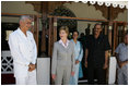 Laura Bush visits with President Amani Abeid Karume, pictured in black, at right, in Zanzibar, Tanzania, Thursday, July 14, 2005.